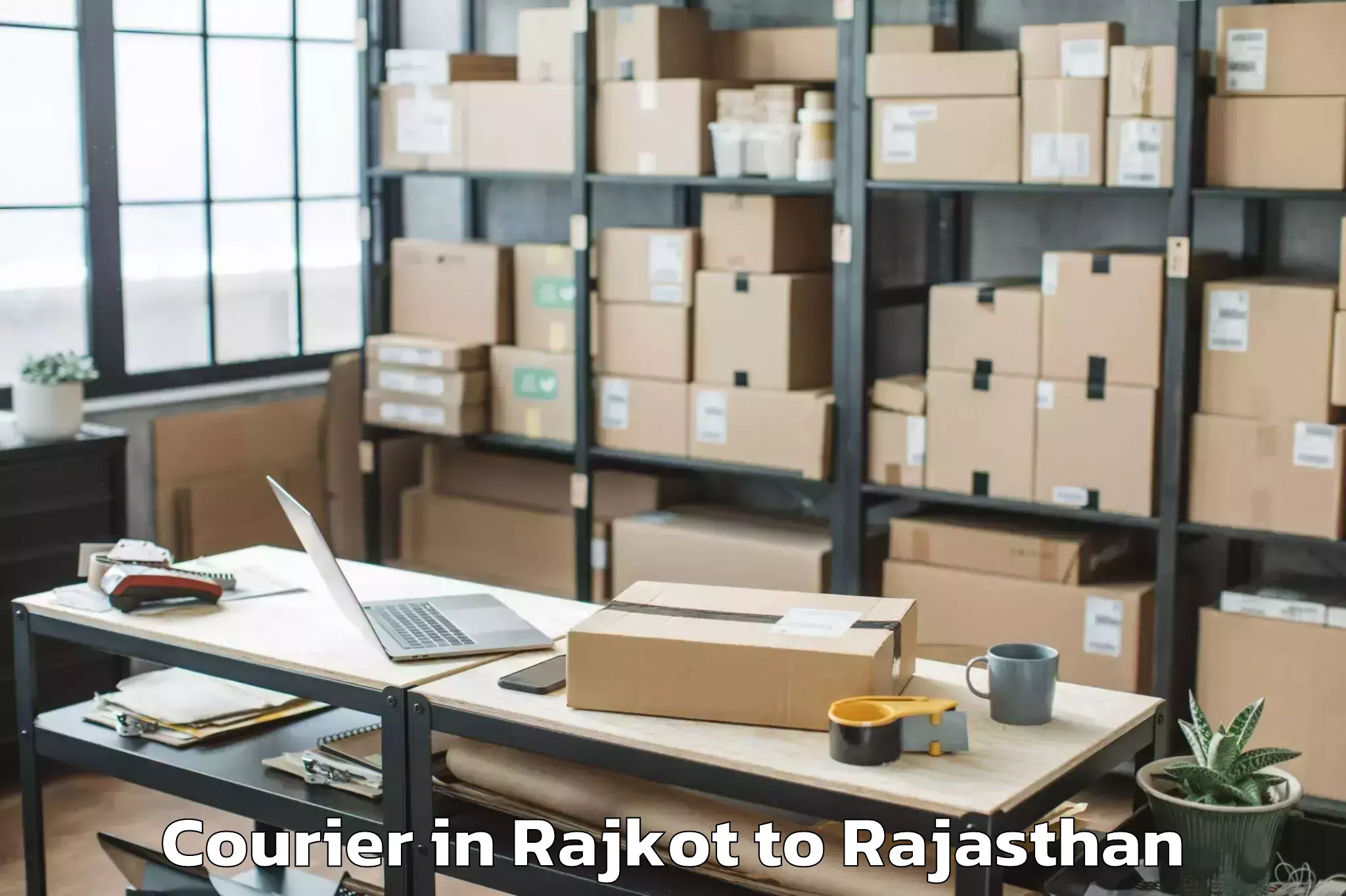 Leading Rajkot to Madanganj Kishangarh Courier Provider